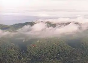 The Luak ridge in morning fog with the Sonthi valley in front