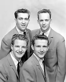 Original group c. 1961 (top left, clockwise): Ussery, Hicks, Girard, Kelly