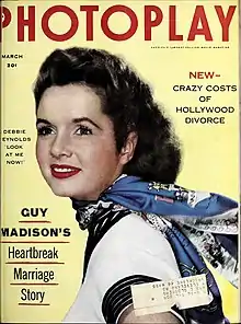 A cover of Photoplay magazine from March 1954. Debbie Reynolds is depicted along with the caption, "Debbie Reynolds: Look at me now!". Other headlines include "Guy Madison's Heartbreak Marriage Story" and "New—Crazy Costs of Hollywood Divorce"