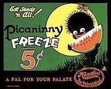 Cartoon of a small, naked, jet-black grinning child silhouetted against a full moon with exaggerated eyes and lips, holding a large frosty watermelon slice; text reads, "Eat Seeds 'n All! Piccaninny Freeze: 5¢: A Pal for Your Palate"