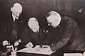 Mussolini initialling the Four-Power Pact on 7 June 1933