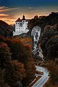 View of the Hercules' Club rock formation and Pieskowa Skała Castle