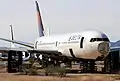 A Boeing 767 formerly operated by Delta Air Lines being disassembled for parts at Pinal Airpark