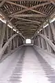 Inside of the bridge showing the double span Burr arch truss