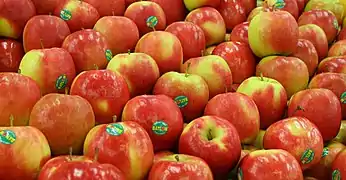Stacked Pink Lady apples on sale in Australia