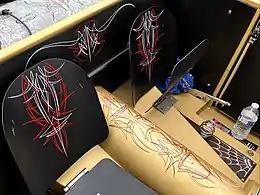 Pinstriping in the interior of a hot rod.