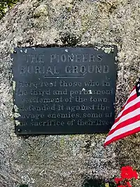 The cemetery's marker, prior to its removal