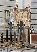 Pulpit; by Nicola Pisano; 1265–1268; marble; height: 4.6 m; Pisa Baptistery (Italy)