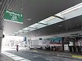 The platform of the BRT station. People are not allowed to walk through the road to the other platform.