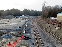 Platform foundations next to a curved railway line