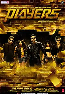 Five people are seen in the poster, three men and two women. Two of the men are sitting atop of gold bricks, holding guns. The other three are standing behind them. Both women are wearing revealing tops, showing their torso, one of them also has a gun in her hand.