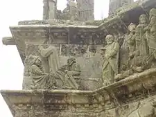 In this view of the north face of the Pleyben calvary we see Jesus praying in the Garden of Olives surrounded by two sleeping apostles. We then see St Peter with his sword looking down to his left at the scene depicting Jesus' arrest.