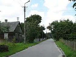 Houses by the road in Hołówki Małe