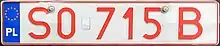 A rectangular plate reading S0715B in red