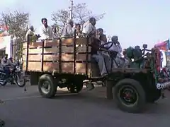 Jugaad vehicle Peter Rehra carrying passengers to a political rally in Agra, India.