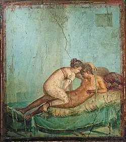 An erotic scene between a male and a female. Wall painting, Pompeii, 1st century.