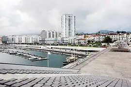 The urbanized coastal limit of Ponta Delgada at São Sebastião, including the commercial mall and business quarter, as seen from the Portas do Mar