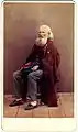 A beggar, by Carlo Ponti, hand-coloured albumen print