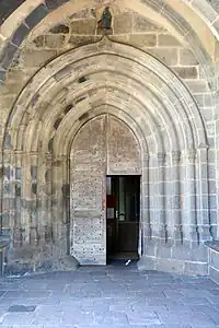 Archivolt surrounding the church entrance at the back of the porch.