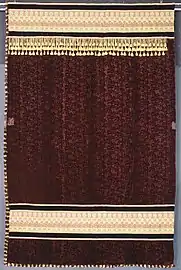 Portière showing draft-excluding fringe on two sides, silk velvet, cotton, wool, circa 1878–80