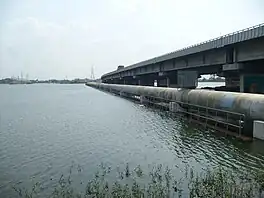 The Porur flyover section of Phase I of the Chennai bypass passing through Porur Lake