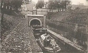 Trolley boat at the canal tunnel of Pouilly-en-Auxois