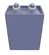 Power film capacitor in rectangular housing