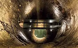 View of the cistern of the Etruscan well with detail of the walkway.