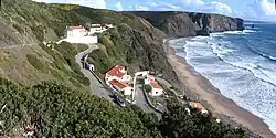 Praia da Arrifana with the Needle Stone visible in the top right corner