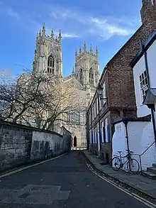 Looking east down Precentor's Court, from in front of Fenton House to York Minster, in 2023