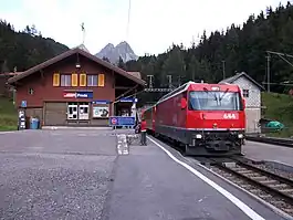 Railway station in Preda with an electrified regional RegioExpress (RE) train