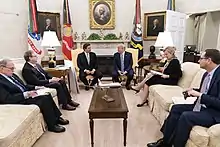 DeSantis and Trump adjacently seated in the Oval Office