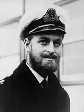 A photograph of a young, bearded Philip