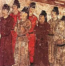 "A group of eunuchs. Mural from the tomb of the prince Zhanghuai, 706, Qianling, Shaanxi."