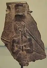 Prisoner of the Akkadian Empire, nude, fettered, drawn by nose ring, with pointed beard and vertical braid. Fragment of a vase possibly from Warka, ancient Uruk. Thought to depict a typical Marhasi. 2350-2000 BCE, Louvre Museum AO 5683.
