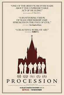 The silhouettes of six people standing in front of a church.