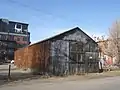 Empty warehouse, 2985 Huron Street, looking west. Later demolished for Griffis North Union.