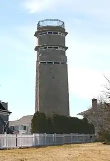 Former fire control tower resembling a lighthouse, Hull, MA