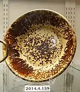 Pudding dish, Boston Earthenware Manufacturing Company, c. 1860, lead-glazed yellow earthenware, Rockingham glaze