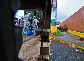 Puerto Rico National Guard with water trucks