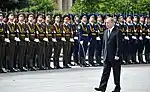 Russian President Vladimir Putin passing in front of the guard on Victory Square