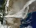 Image showing a large plume of volcanic ash blowing about 800 kilometers east and then northeast over Argentina.