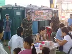 Reservists provide security and assist medical personnel during the conduct of Medical and Dental Civic-Action Program (MEDCAP) at Bgy Nagkaisang Nayon, QC.