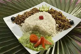 A dish of keema served with cooked rice in Karachi, Pakistan