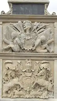 Detail of central panel below statue of Queen Anne