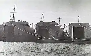 HMAS LST 3008 (at right) in 1946