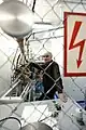 Eduard Kozulin, head of group at the Laboratory of Nuclear Reactions, checking the experiment readiness of the super sensitive analyzer of heavy atoms mass.