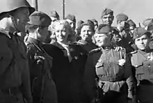 Lyubov Orlova sees off Soviet troops departing to the front