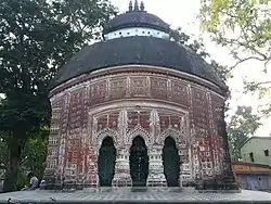 Rajbalhat: The Radhakantajiu (in picture) and other temples are there. Durga is worshipped in Jangipara and Rajbalhat as Rajballavi. She is a mixed form of Durga, Kali and Saraswati. It is famous for handloom saris.