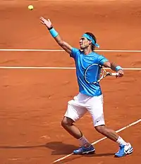 Rafael Nadal serving at the 2011 French Open.